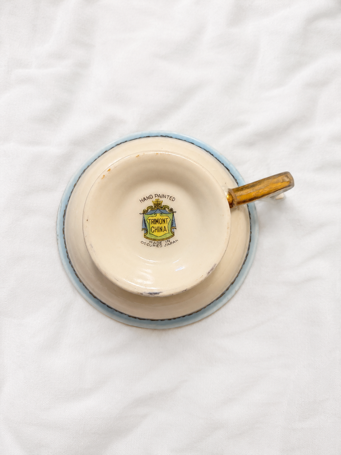 Vintage Hand-Painted Trimont China Teacup – Occupied Japan Floral Blue Interior Gold Handle